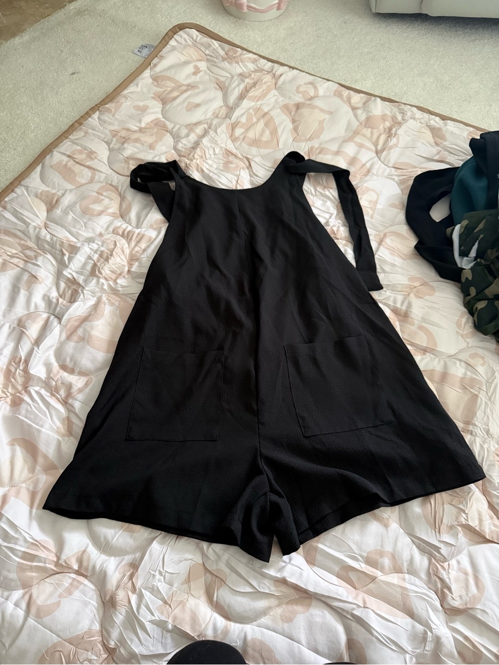 SHEIN Black Sleeveless Romper with Front Patch Pockets